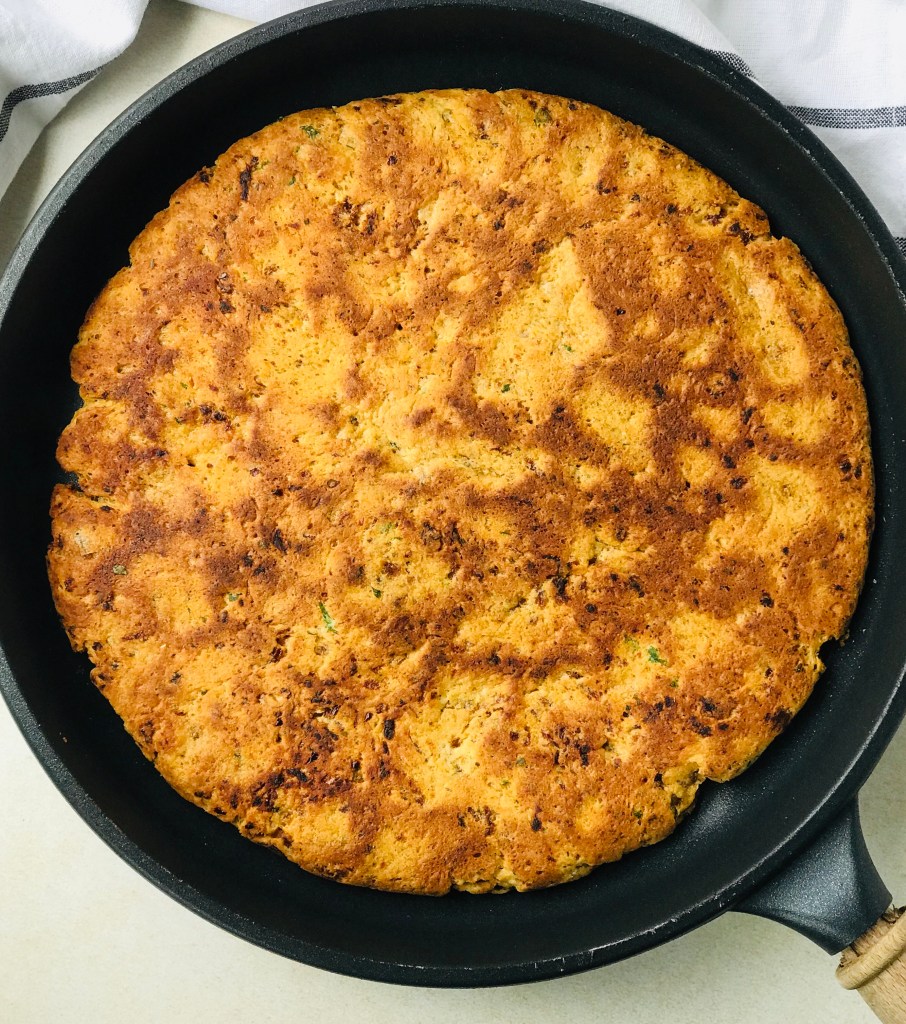 Sun-dried tomato flatbread in pan